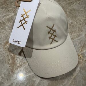 RHONE Cream Baseball Cap with Gold Logo